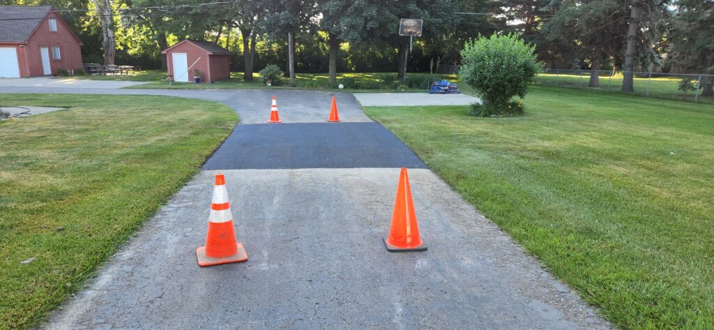 Orange Safety cones - Hartwick Asphalt and Sealcoating Michigan